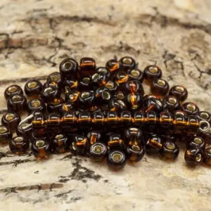 Enkel retur - Seed Beads silverlined 5 mm, Mörk bärnsten (20g)